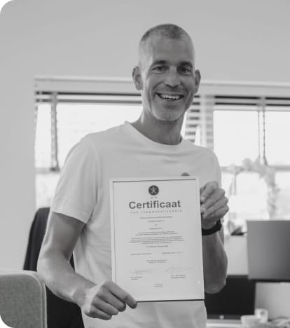 A man standing with a certificate of digital accessibility